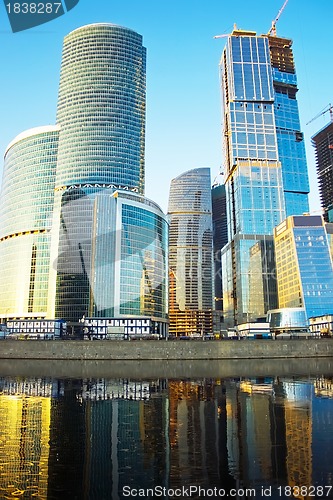 Image of Modern skyscrapers at sunset