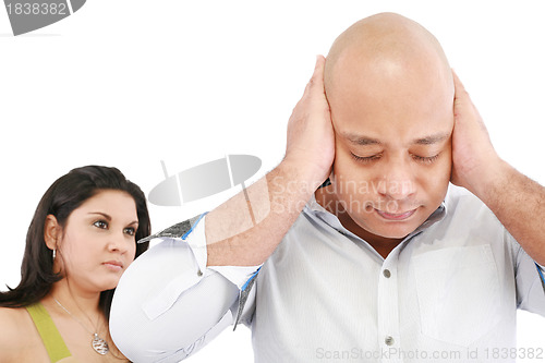 Image of Young man and woman angry and conflicting, focus on man