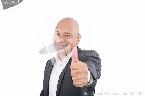 Image of young business man going thumb up, isolated on white