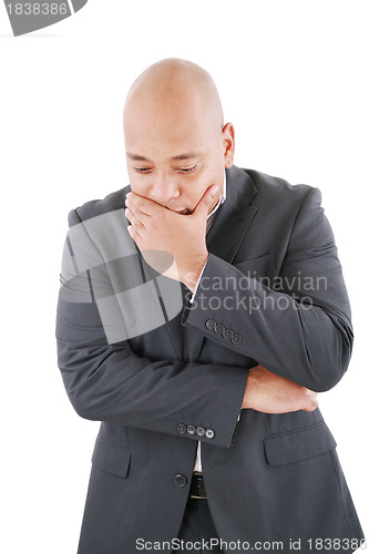 Image of Portrait of a pensive worried businessman in studio on isolated 