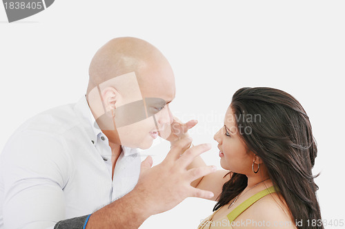 Image of Studio shot of a young couple fighting 