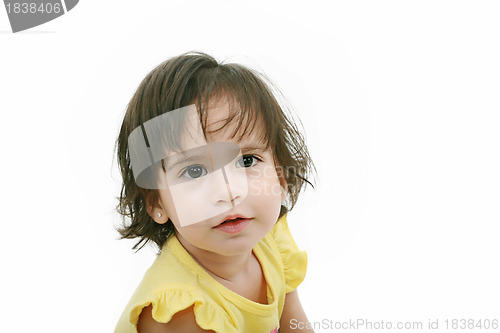 Image of Photo of adorable young girl looking at camera