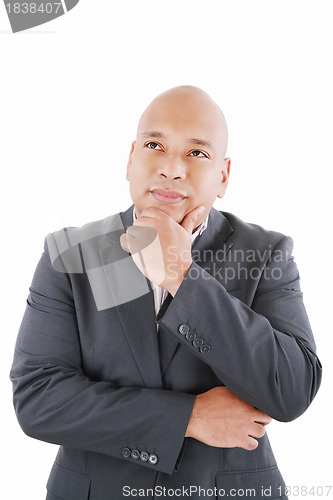 Image of Portrait of handsome young thoughtful businessman isolated over 