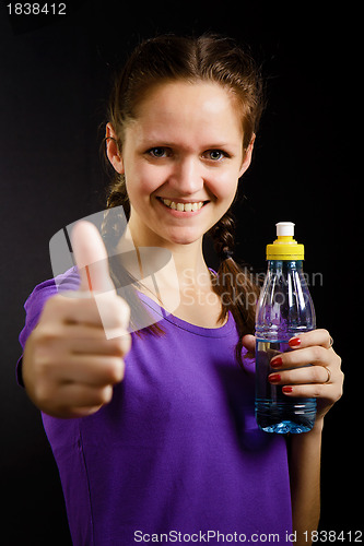 Image of woman with a bottle of water