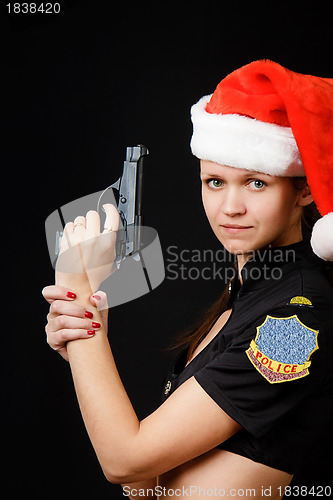 Image of sexy girl cop with a gun