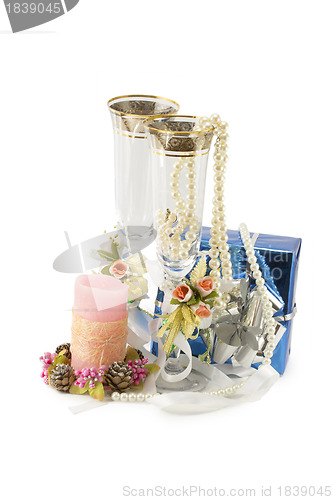 Image of Costume jewelry, candles, wine glasses