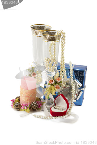 Image of Costume jewelry, candles, wine glasses