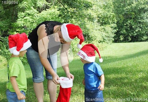 Image of Mother and children at CHristmas time