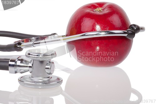 Image of Stethoscope and apple