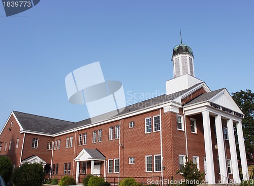 Image of Brick church with steeple