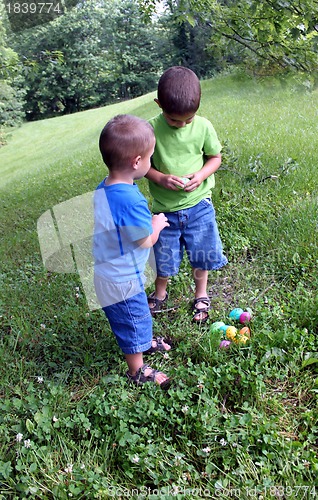 Image of Brothers finding Easter eggs
