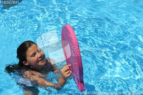 Image of Pretty little girl in pool