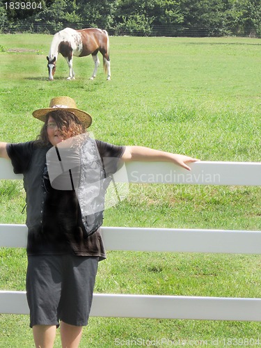 Image of Teenage boy at the ranch