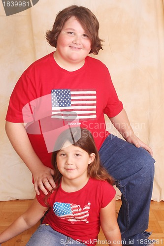 Image of Portrait of teen boy and sister