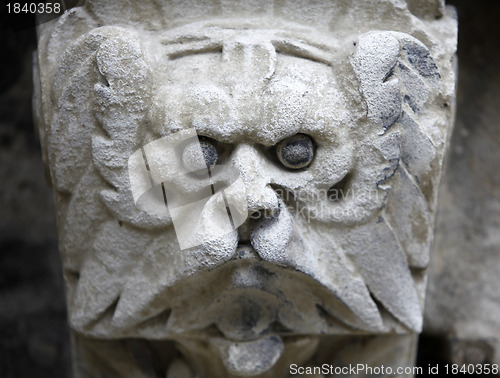 Image of Sculpted stone mask figure on St. Stephen's Cathedral in Vienna