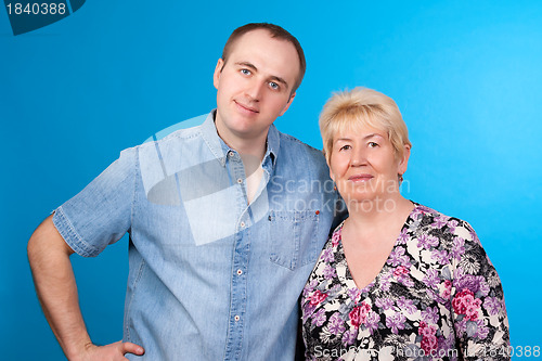 Image of portrait of mother and son in a studio