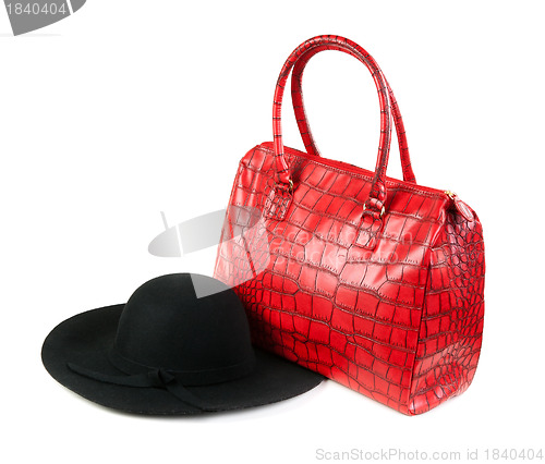 Image of Red Fashion ladies handbag and a black felt hat