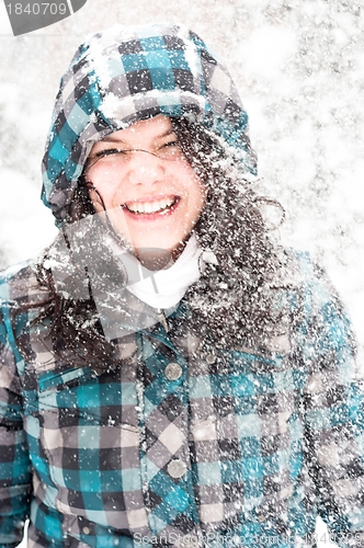 Image of Photo of a young woman in the snow