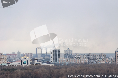 Image of Tall buildings and forest