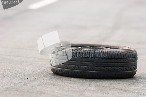 Image of Car tire on the road