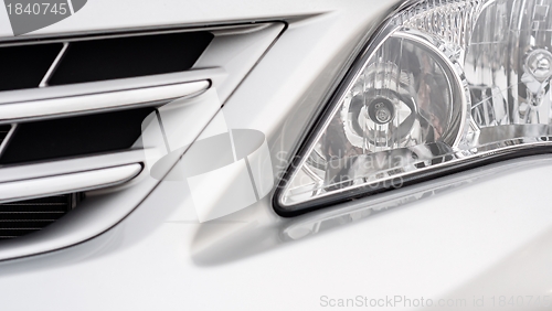 Image of Front light of a clean car