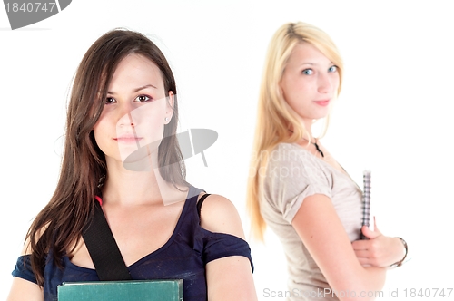 Image of Two beautiful student girls getting ready for school