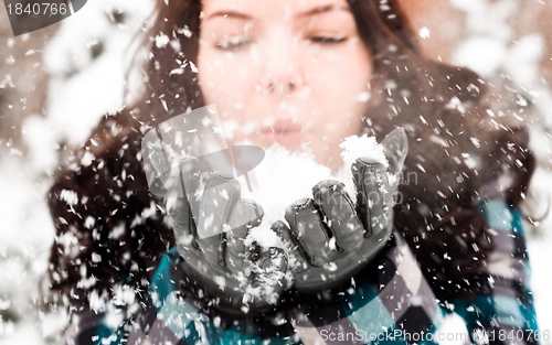 Image of Photo of a young woman in the snow