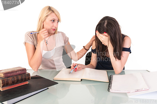 Image of Two beautiful student girls getting ready for school