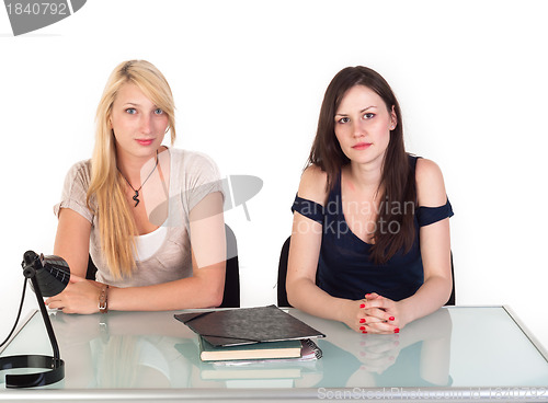 Image of Two beautiful student girls getting ready for school