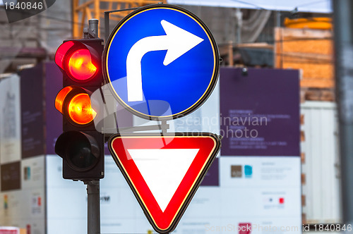 Image of traffic signs and lamp