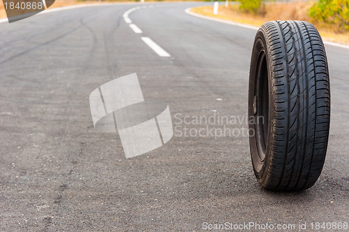 Image of Car tire on the road