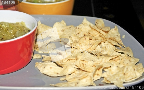 Image of plates, chips, salsa