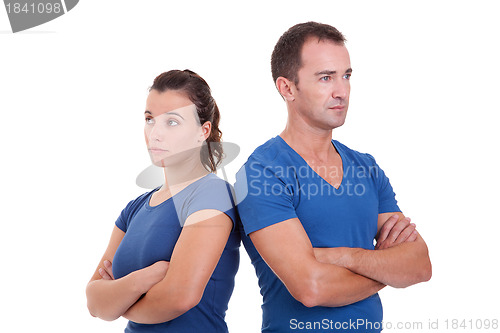Image of upset couple, back to back