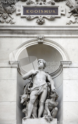 Image of Burgtheater, Vienna, statue shows an allegory of egoism