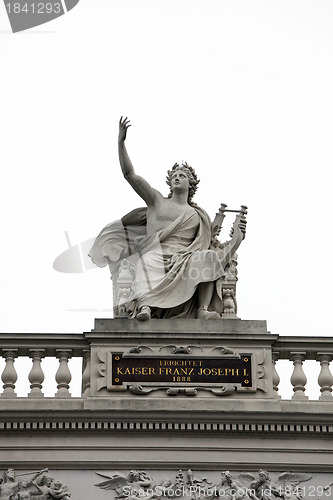 Image of Burgtheater, Vienna, statue shows a seated Apollo