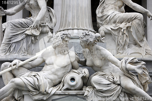 Image of Detail of Pallas-Athene fountain in front of Austrian parliament, Vienna, Austria. Sculptures represent rivers Danube and Inn