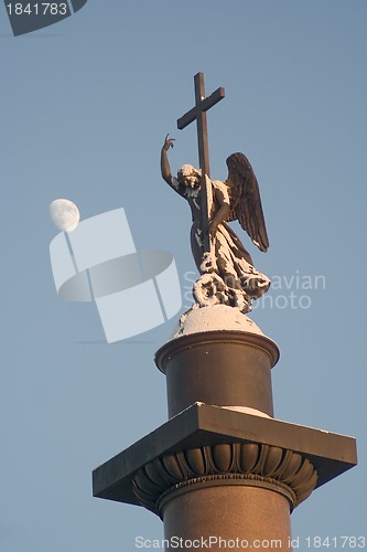 Image of Moon and snow-covered angel