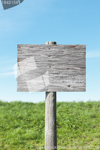 Image of Blank old sign on sunny day