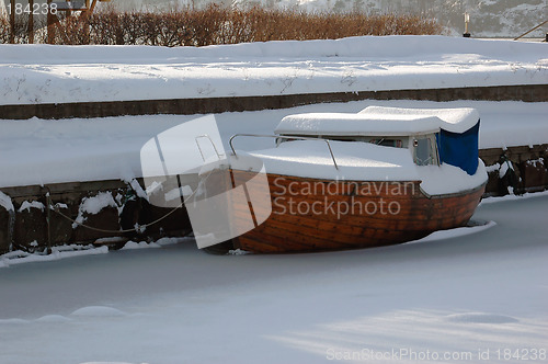 Image of Wooden boat in ice # 01