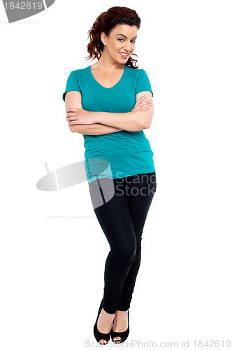 Image of Cheerful woman posing with her hands crossed