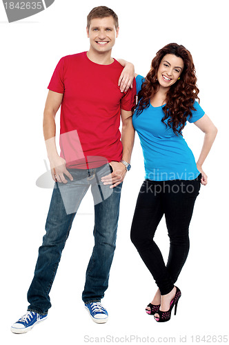 Image of Girlfriend resting hands on her boyfriends shoulder