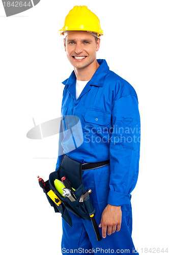 Image of Young smiling industrial contractor