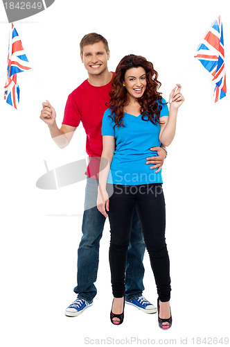 Image of Cheerful UK supporters posing together