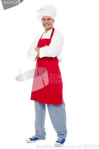Image of Full length portrait of chef posing in style