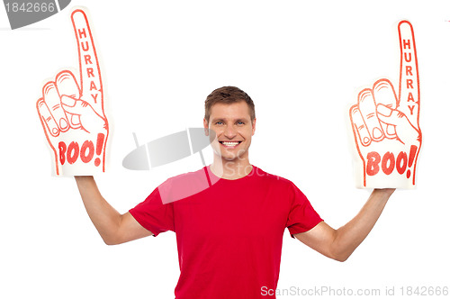 Image of Young energetic fan showing his support