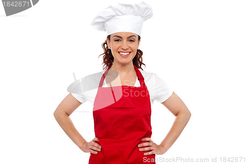 Image of Cure female chef posing with hands on her waist