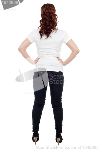 Image of Rear view of a young woman