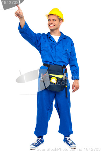 Image of Construction worker pointing at copy space area