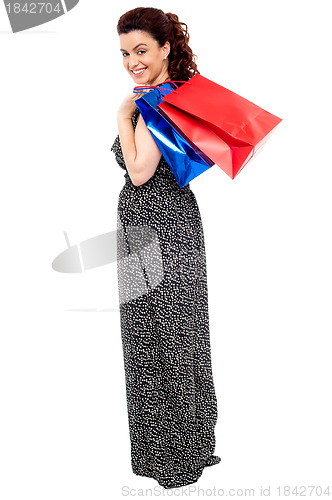 Image of Full length portrait of shopaholic woman