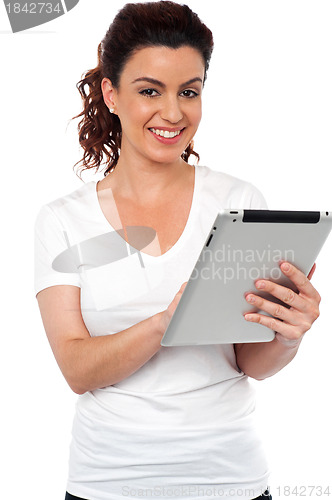 Image of Pretty woman using tablet device